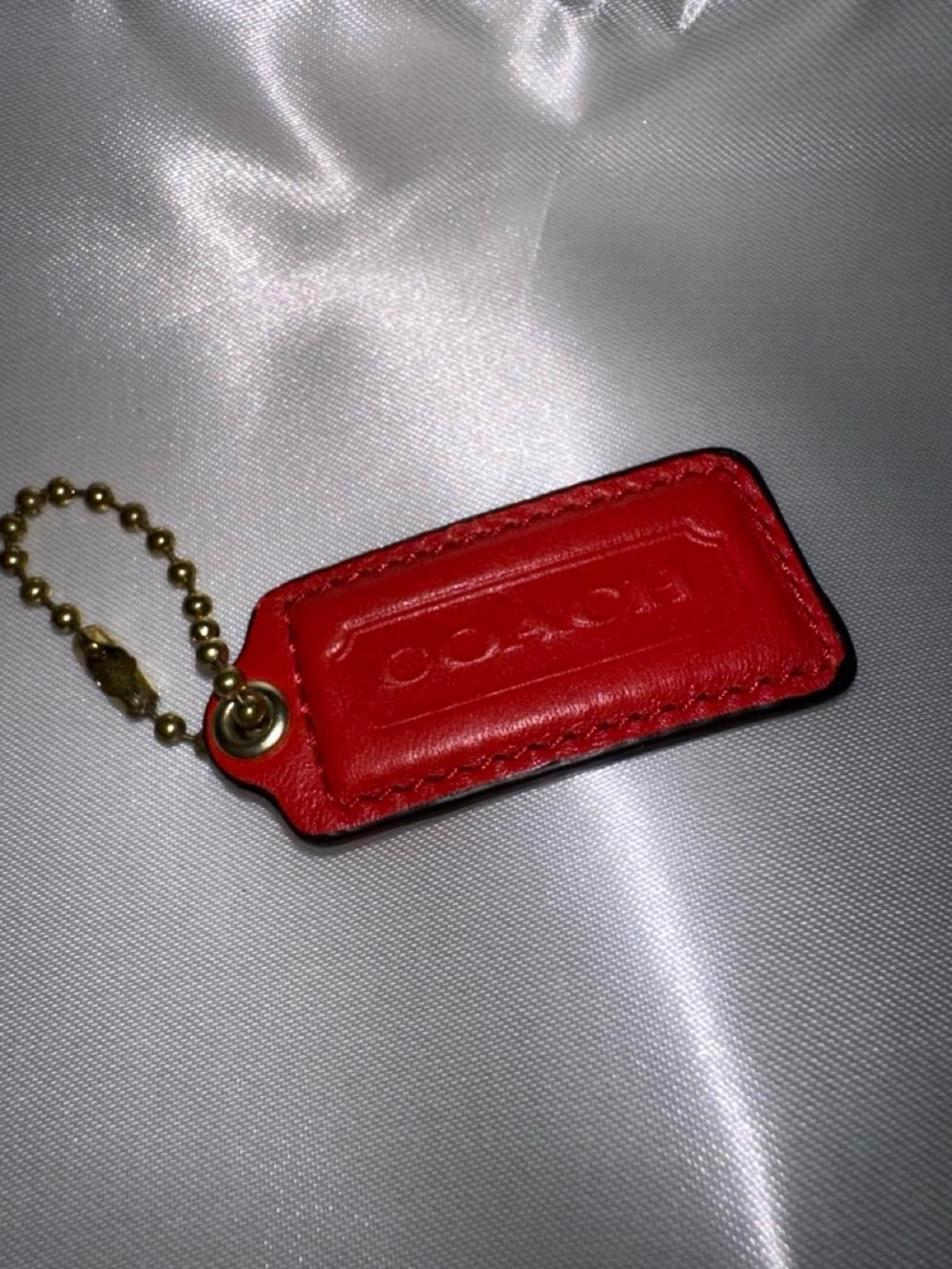 COACH Red Leather Hang Tag with Gold Chain